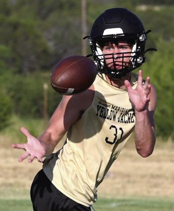 Working out without pads focusing on skills and conditioning, the Jackets took the field Monday to begin preparing for the 2023 Texas high school football season (above). Working out in heat that exceeded 105 degrees, the Jackets took extra water breaks. Photos courtesy Brett Voss’ The Sports Buzz