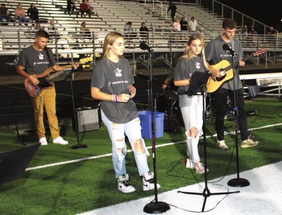 Clifton High School FCA members lead Fields of Faith at Cub Stadium Tuesday evening, Ashley Barner | The Clifton Record