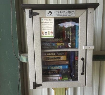 After receiving a grant from TNMP, Meridian Public Library installed Little Library boxes in Bosque County communities without public libraries. Shown left is Library board member Dana Williams in Kopperl. Photos Courtesy of Meridian Public Library