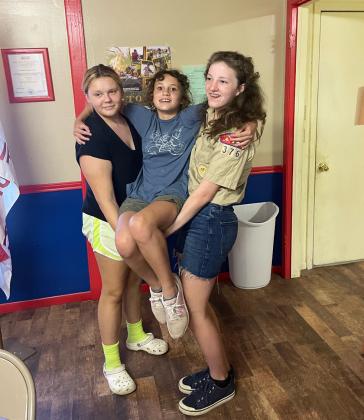 Troop 376G members precticing their first aid skills – how to carry an injured friend – in 2023. Courtesy Photo By Scouts BSA Troop 376G