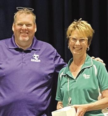 Clifton Elementary School Principal Wes Brown (from left) recently recognized Sheri Dyson for her nine years at CES and 32 years in public education. Photo Courtesy of Clifton ISD