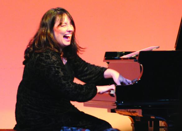Concert pianist Sharon Bjorndal Lavery lit up the Frazier Performance Hall not only with her lively performance but also with her smile during the McLennan Community Orchestra’s concert on Saturday, June 17, at the Bosque Arts Center in Clifton. Nathan Diebenow | The Clifton Record