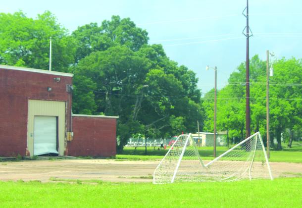 Nathan Diebenow | Meridian Tribune Flood waters coupled with debris damaged the metal door at the Armory and a soccer goal at Clifton City Park on Monday morning, May 6.