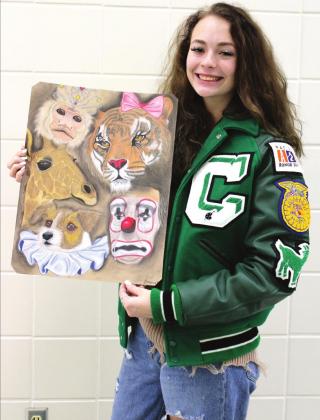 Ashley Barner | The Clifton Record Senior Cambria Blanton is the first student in CISD history to letter in Art. Experimenting with pastels, her piece here shows the dark side of the circus industry.