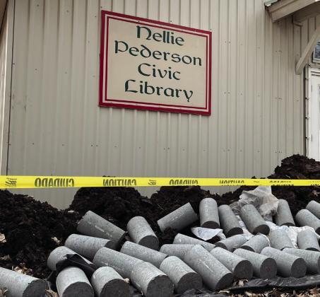 Last month, the Nellie Pederson Civic Library received 27 double-pressed concrete piers under its perimeter fix its foundation. Nathan Diebenow | The Clifton Record