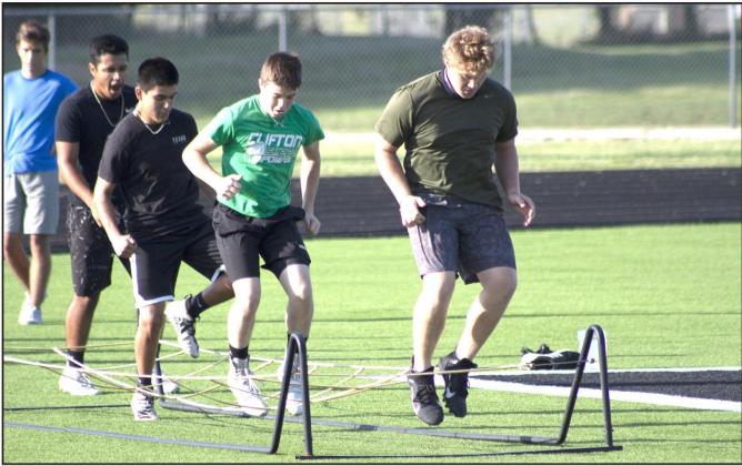 Allen D. Fisher | The Meridian Tribune Clifton student-athletes work field drills Friday morning at Cub Stadium.