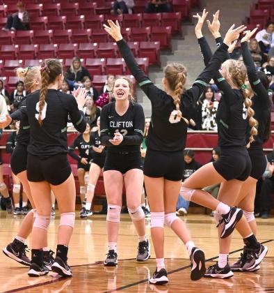 Lady Cubs celebrate Class 3A Bi-District Playoff match-winning point against Palmer in Hillboro. Photo courtesy of Brett Voss’ The Sports Buzz