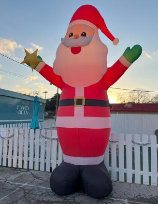 An inflatable Santa Claus greeted folks who recently attended the annual Bosque Animal Rescue Kennels, Inc. membership meeting at The Fancy Bean on the corner of Highway 6 and Highway 219 in Clifton. BARK reported that its volunteers had adopted 65 dogs in 2023. Nathan Diebenow | The Clifton Record