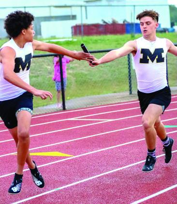 Meridian senior Dustin Bowers pushes hard in the 4x100-meter relay as the Jackets qualifed for state in 4x400-meter relay as well (top left); Senior John Bernal wins the 100-meter dash at regionals (top right); Braxton takes the baton (above). Photos courtesy of Brett Voss’ The Sports Buzz