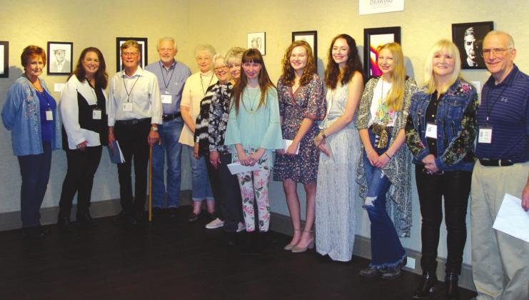 Art Council members are shown with a few winners from the High School Student Art Show. From left to right are Council members Judi Boston, Karen Cornett, John Linn, Don Boysen, Betty Murdoch, Leanne Donner, and Virginia Richards (president); students Sarah Tyler, Rebekah Tyler, Cambria Blanton, and Brenna Bertelson; Council member Peggy Reed and 2022 judge Joe Barbieri. Courtesy Photo