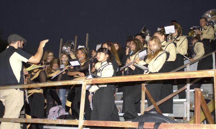 Below Right, the Meridian High School band plays for the Yellow Jackets at Meridan’s game agains Hubbard last Friday.