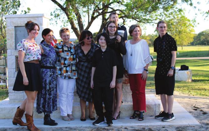 Rebekah Manley, Gloria Meraz, Marianne Woerner and Pam Hardcastle, along with members of the Lomax family, celebrate the dedication of the John A. Lomax National Literary Landmark at the amphitheater in Meridian. Ashley Barner | The Clifton Record