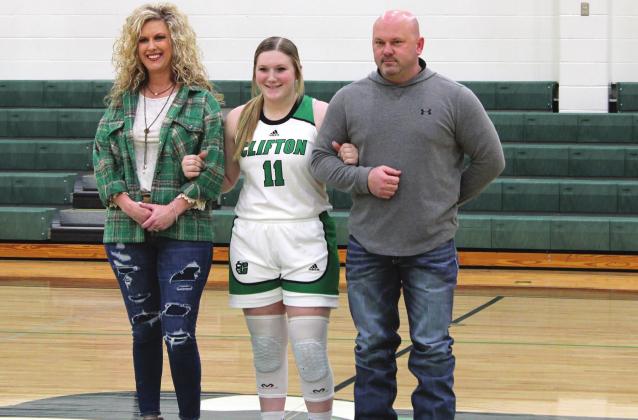 Below, Lady Cubs senior Kynli Bearden is escorted onto the court by her mother and father, Sherri and Jason Bearden. Brook DeZavala | The Clifton Record