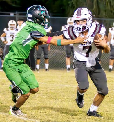 Morgan sophomore Adrian Alonzo (2) makes the tackle aganst defending District 10-1A, DII champion Bynum Friday. Photo by Wendy Orozco courtesy of Brett Voss’ The Sports Buzz