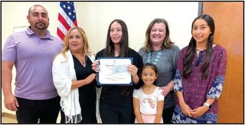 “Patriots of the American Revolution” essay contest award was given to Brithza Areola, a 9th grader at Clifton High School. She is pictured with her family (from left) and Chapter Regent Liz Caraway. Photos Courtesy of Bosque Valley Chapter, NSDAR