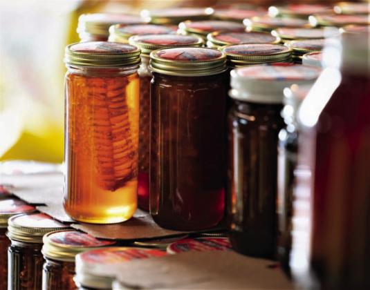 Jars filled with Texas honey. Production was expected to be below-average due to drought. Laura McKenzie | Texas A&amp;M AgriLife