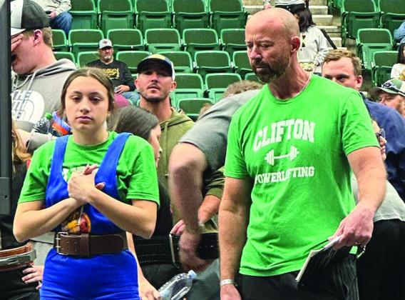 Lady Cub Kambrie Kettler takes her place on the podium after collecting a fifth place medal at the THSWPA State Meet last Thursday (top); Cameron Ritz prepares for next lift as Clifton Powerlifting head coach James Humphreys looks on (above). Courtesy Photos