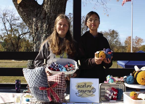 Arianna Sandley and Pearl Dong sold items at the Bosque Children’s Business Fair in Meridian on Saturday, December 3.