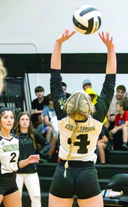 Lady Jacket senior Hope Cabrera (10) makes the block at the net (top); Meridian senior Canyon Stauffer (4) sets up the attack (above). Photos by Wendy Orozco courtesy of The Sports Buzz